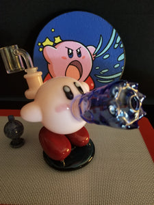 Saiyan Glass Kirby "Inhale" Comes with:  Rig, Custom made Mart Kirby mat, Bubble Cap, Banger, 1 minute timer, and case
