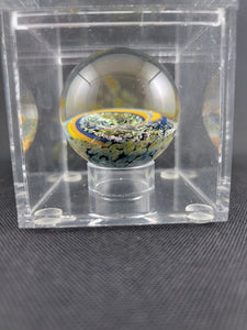 Amorphous Art Glass Orange Dichro Vortex Marble